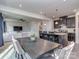 Open-concept living area featuring a kitchen with an island, and a comfortable living space at 1607 Tundra Ln, Denver, NC 28037