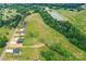 Beautiful aerial view of several newly constructed homes located on spacious lots near a pond and green space at 181 Lone Pine Rd, Statesville, NC 28625