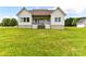 Lush backyard showing the rear elevation of the home at 181 Lone Pine Rd, Statesville, NC 28625