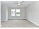 Empty bedroom with a ceiling fan and window at 181 Lone Pine Rd, Statesville, NC 28625