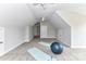 Bright bonus room with plush carpet, ceiling fan, and ample space for various activities at 181 Lone Pine Rd, Statesville, NC 28625