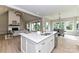 Bright kitchen features a large island with seating, stainless steel appliances, and an open floorplan at 181 Lone Pine Rd, Statesville, NC 28625
