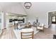 Spacious living room with an open floor plan leading to the kitchen, featuring stylish decor and ample natural light at 181 Lone Pine Rd, Statesville, NC 28625