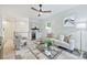 Well-lit living room with stylish decor, hardwood floors, and a comfortable seating arrangement at 1834 Arnold Dr, Charlotte, NC 28205