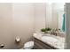 Half bathroom featuring a granite vanity, a mirror, and a modern toilet at 1858 Brevard Place Rd, Iron Station, NC 28080