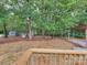 A view of the backyard and mature trees from the new deck at 2070 Stirewalt Rd, China Grove, NC 28023