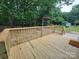 A new deck overlooks the spacious backyard at 2070 Stirewalt Rd, China Grove, NC 28023