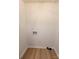 An empty room with washer and dryer hookups and light wood-look floors at 2070 Stirewalt Rd, China Grove, NC 28023
