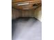 An empty storage room, ready for your belongings, with wooden walls and a dark floor at 2070 Stirewalt Rd, China Grove, NC 28023