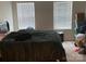Bedroom with natural light, and neutral carpet flooring at 211 Hidden Lakes Rd, Statesville, NC 28677