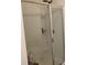 Modern shower with sliding glass door and built-in shelving for storage at 211 Hidden Lakes Rd, Statesville, NC 28677