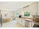 Bright kitchen features granite countertops, stainless steel appliances, and adjoining breakfast nook at 2301 Seth Thomas Rd, Charlotte, NC 28210