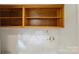 Laundry room featuring top shelves and connections for a washer and dryer at 2301 Seth Thomas Rd, Charlotte, NC 28210