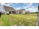 Large fenced backyard with green grass, patio, grill, and gazebo at 2317 Trollinger Dr, Catawba, NC 28609