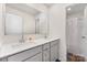 Clean and modern bathroom with double sinks, white countertops, and gray cabinets for ample storage at 2317 Trollinger Dr, Catawba, NC 28609