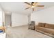 Large bonus room features neutral paint, ceiling fan, carpet flooring and comfortable seating at 2317 Trollinger Dr, Catawba, NC 28609