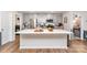 The bright kitchen features a large island, stainless steel appliances, and light gray cabinets at 2317 Trollinger Dr, Catawba, NC 28609