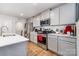 Modern kitchen featuring gray cabinets, stainless steel appliances, and a white countertop at 2317 Trollinger Dr, Catawba, NC 28609