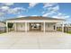 Covered pool entrance with gray siding and white columns and black iron fence at 2317 Trollinger Dr, Catawba, NC 28609