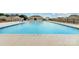 Exterior view of a large swimming pool surrounded by a concrete deck and black fence at 2317 Trollinger Dr, Catawba, NC 28609