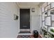Close up on a front door with modern appeal, brick exterior and decorative accents at 2424 Cumberland Ave, Charlotte, NC 28203