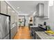 Bright kitchen featuring stainless steel appliances, granite countertops, and hardwood floors at 2424 Cumberland Ave, Charlotte, NC 28203
