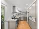 Modern kitchen with stainless steel appliances, ample storage, and granite countertops at 2424 Cumberland Ave, Charlotte, NC 28203