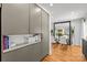 Modern kitchen with stainless steel appliances, stone countertops, and hardwood floors at 2424 Cumberland Ave, Charlotte, NC 28203