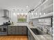 Stylish kitchen with stainless steel appliances, granite countertops, and decorative backsplash at 2424 Cumberland Ave, Charlotte, NC 28203