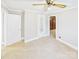 Neutral bedroom with carpet, a window, and a closet with a mirrored door at 271 Nc 16 N Hwy, Taylorsville, NC 28681
