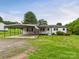 Charming single-story home with a covered parking area and inviting front yard at 271 Nc 16 N Hwy, Taylorsville, NC 28681