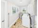 A laundry room with storage and washer and dryer hookups at 271 Nc 16 N Hwy, Taylorsville, NC 28681