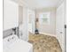 A laundry room with a new washing machine, storage and a door to another room at 271 Nc 16 N Hwy, Taylorsville, NC 28681