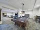 Community game room with billiard table, lounge area, and bar seating at 300 W 5Th St # 339, Charlotte, NC 28202