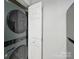 Convenient laundry area with modern washer and dryer unit and storage space at 300 W 5Th St # 339, Charlotte, NC 28202