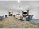 Comfortable lounge area with TV, seating, and access to kitchenette and meeting rooms at 300 W 5Th St # 339, Charlotte, NC 28202