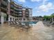 Relaxing pool area surrounded by lounge chairs for residents of luxury apartment complex at 300 W 5Th St # 339, Charlotte, NC 28202