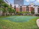 Beautiful putting green and common lawn area for residents of luxury apartment complex at 300 W 5Th St # 339, Charlotte, NC 28202