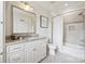 Bathroom features tile floors, a shower and a vanity with a stone countertop at 3032 Kings Manor Dr, Matthews, NC 28104