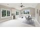 This bonus room features vaulted ceiling, lots of natural light, a sink, and space for table and chairs at 3032 Kings Manor Dr, Matthews, NC 28104