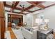 Comfortable living room showcases coffered ceilings, built-ins, and a cozy fireplace at 3032 Kings Manor Dr, Matthews, NC 28104