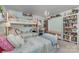 Shared bedroom featuring bunk beds and ample storage at 309 Ogden Dr, Gastonia, NC 28056