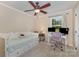 Cozy bedroom featuring a daybed, desk, and ceiling fan at 309 Ogden Dr, Gastonia, NC 28056