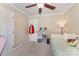 Neutral bedroom featuring a ceiling fan and cube storage at 309 Ogden Dr, Gastonia, NC 28056