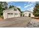 Spacious two-car garage with ample parking space and a basketball hoop for outdoor activities at 309 Ogden Dr, Gastonia, NC 28056