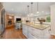 Spacious kitchen featuring stainless steel appliances, island, and wood floors at 309 Ogden Dr, Gastonia, NC 28056
