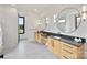 Modern bathroom with double vanities, stylish mirrors, and sleek fixtures, offering a luxurious feel at 309 Sain Rd, Statesville, NC 28625