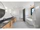 Spacious bathroom featuring double vanities, soaking tub, and walk-in shower offering a spa-like experience at 309 Sain Rd, Statesville, NC 28625