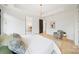 Bedroom featuring an accent chair, stylish decor, and a view to an ensuite bathroom at 309 Sain Rd, Statesville, NC 28625