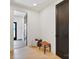 Inviting entryway with a woven bench, natural light, and a glimpse of the next room at 309 Sain Rd, Statesville, NC 28625